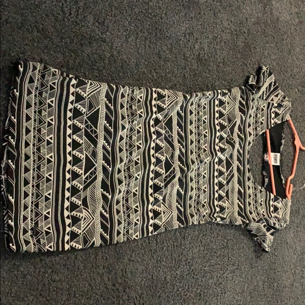 White and black dress with a heart cut out in back